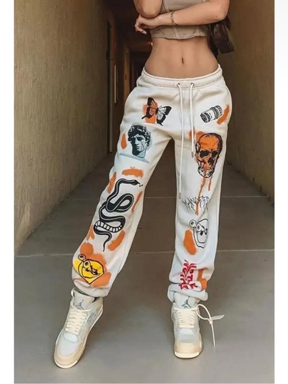 nine britton Cream Graphic Jogger Pants with Orange and Black Accents